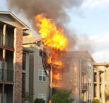 A fire consumes an apartment building.