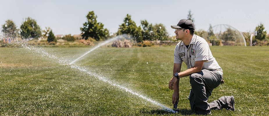 Cosumnes CSD technician doing an irrigation check