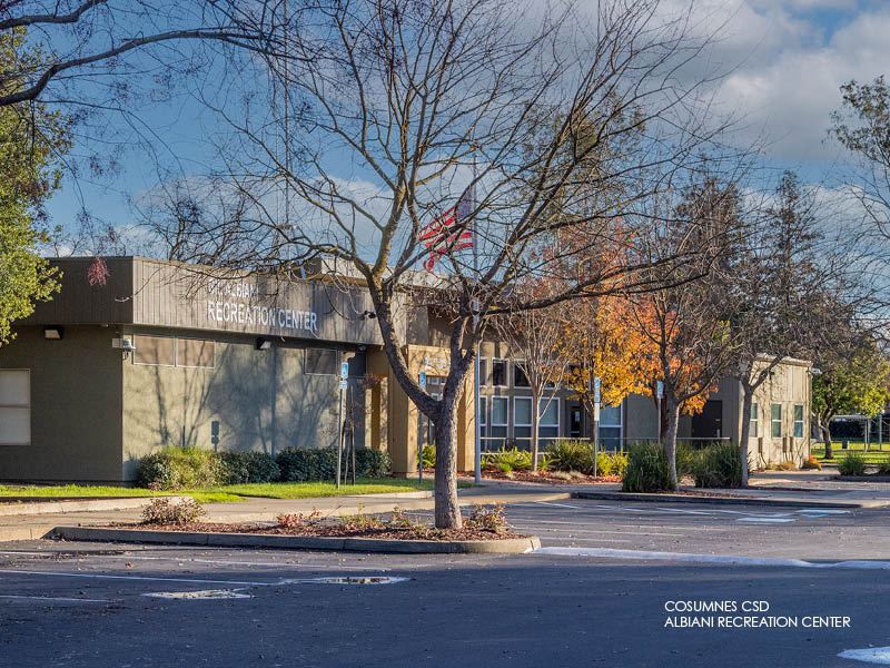 Image of Cosumnes CSD Gil Albiani Recreation Center Building and parking lot.
