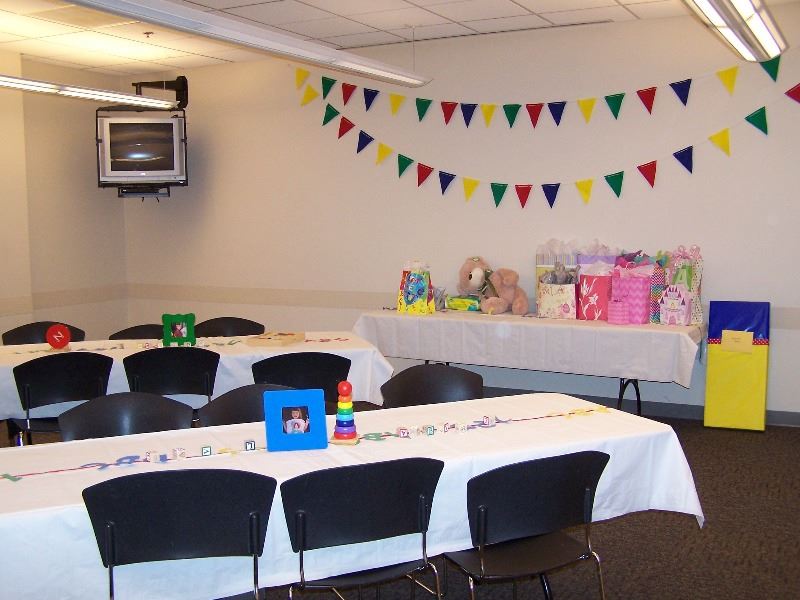 Tables and chairs are set up for a birthday party