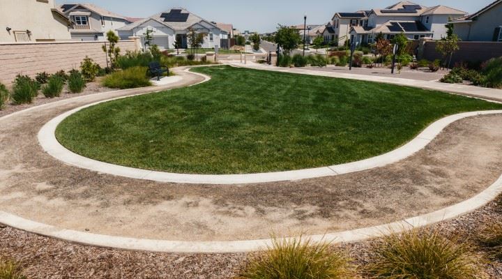 Image of the turf area with jogging trail.